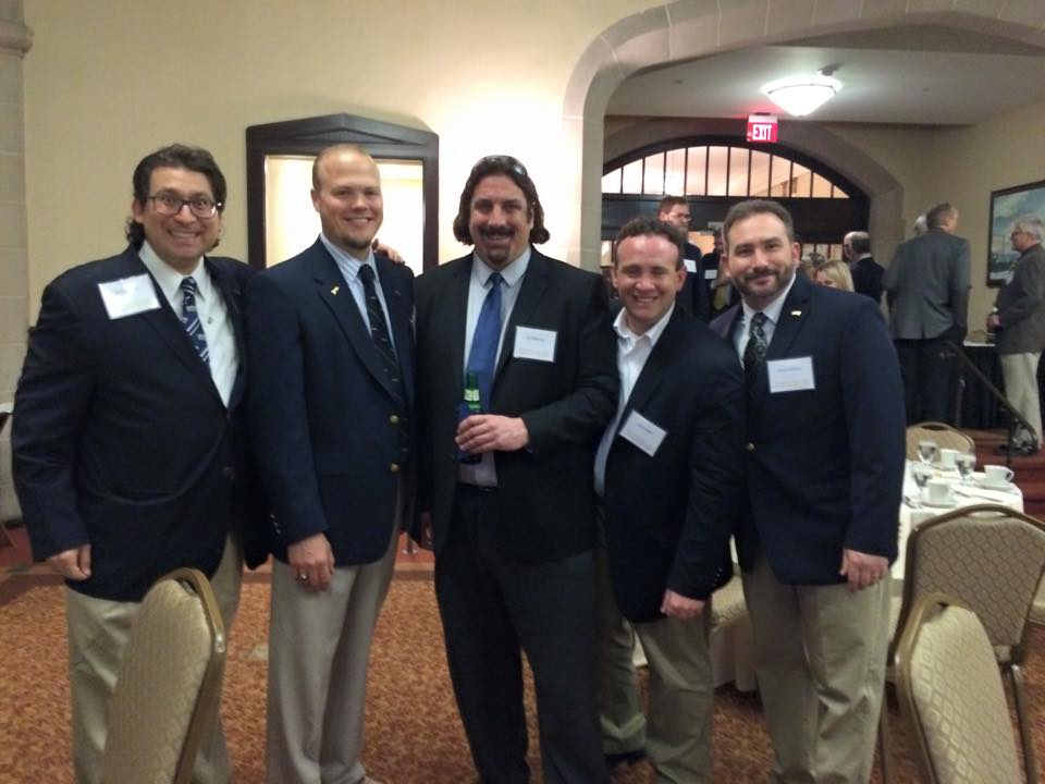 Photo of Donald with four members of his singing group with the University of Pittsburgh Men's Glee Club