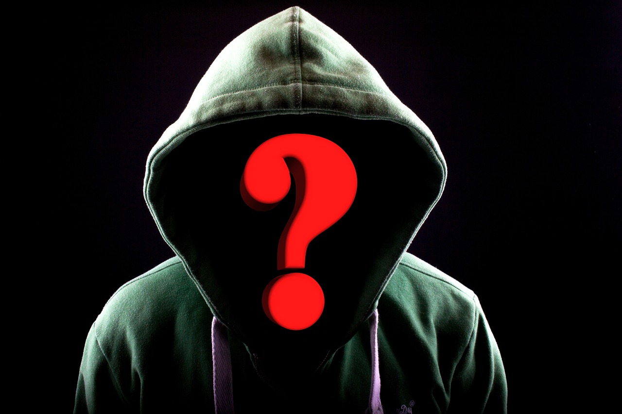 Person in a hoodie with a question mark instead of a face